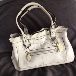 Cream colored soft leather Coach handbag